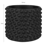 Betonnen bloempot met bolletjes