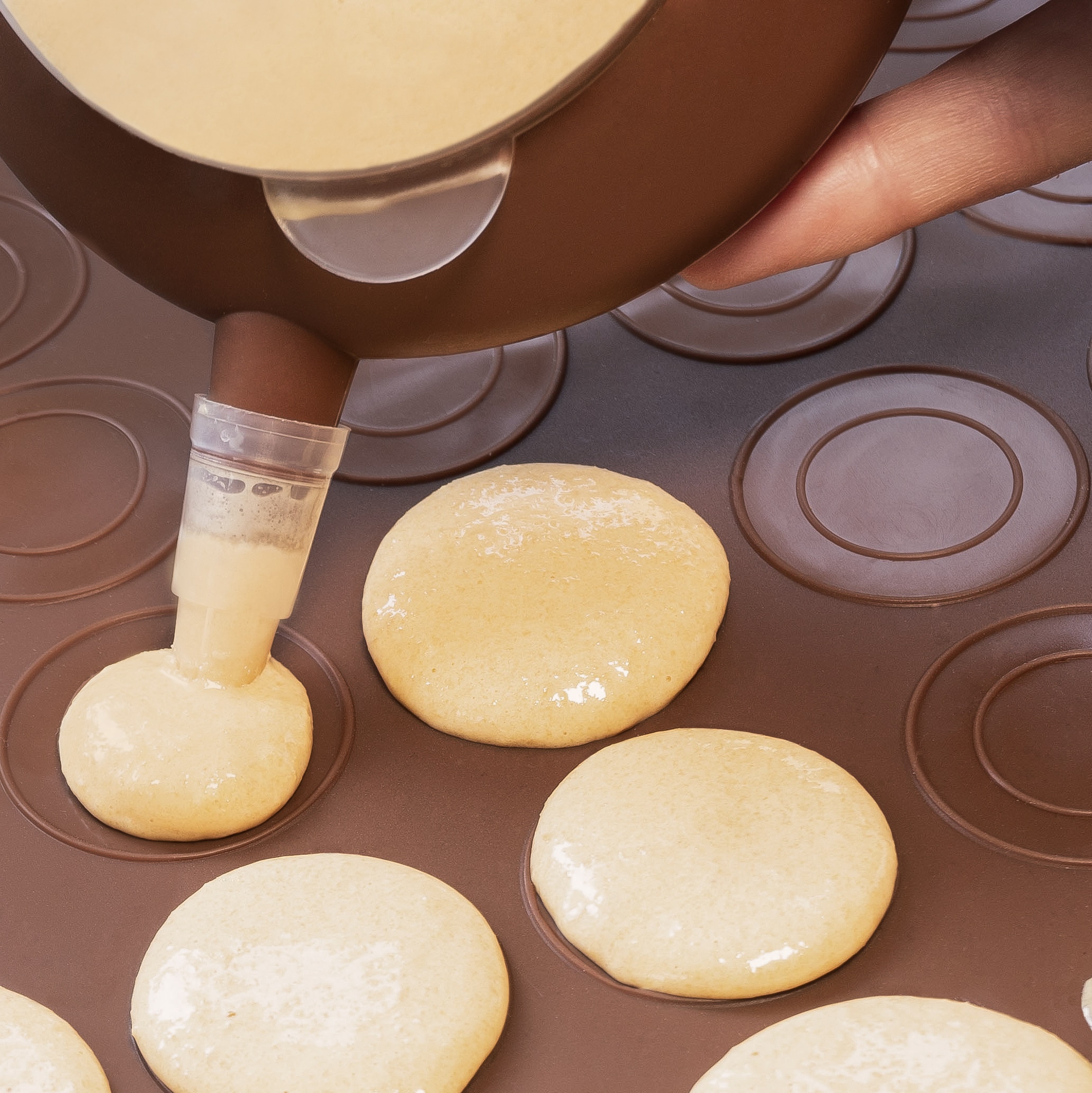 Macaron spuit met bakmat