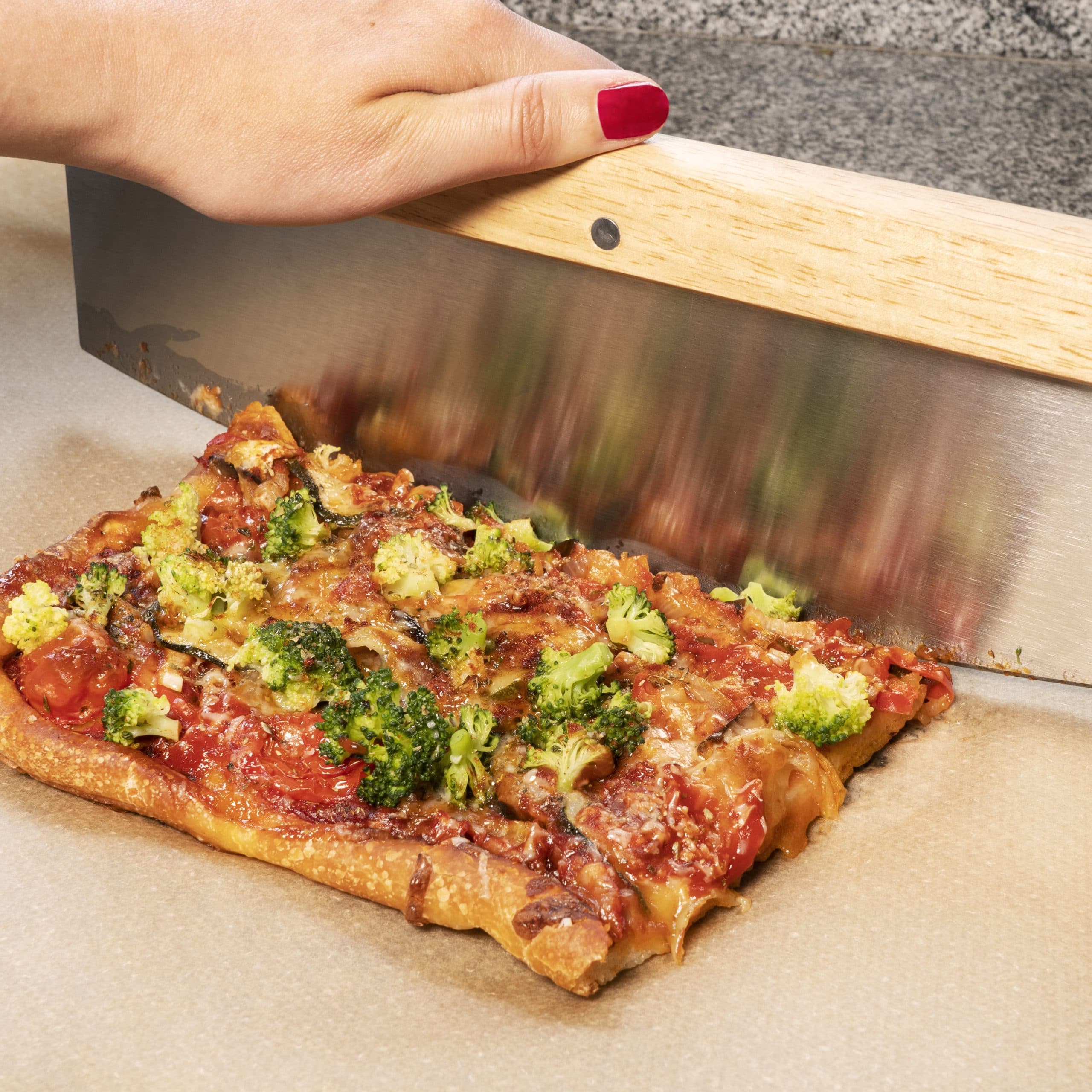 Grote pizzasnijder