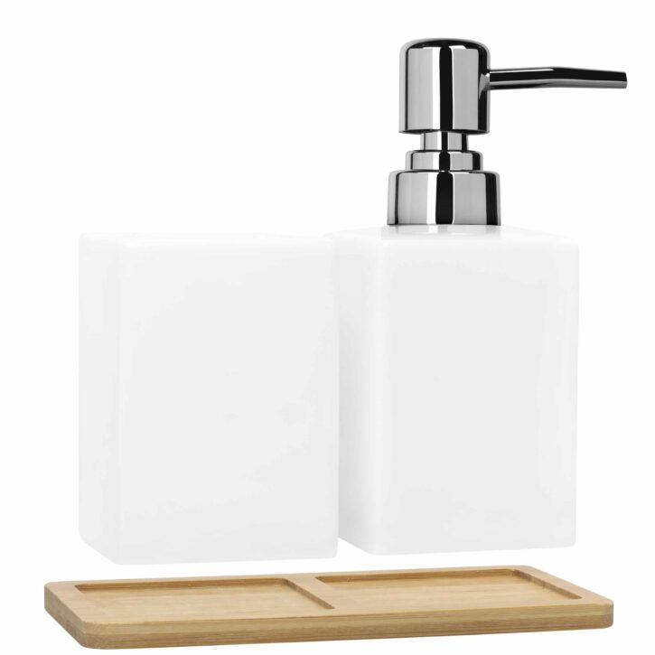 Witte zeepdispenser met tandenborstelbakje met houten plank